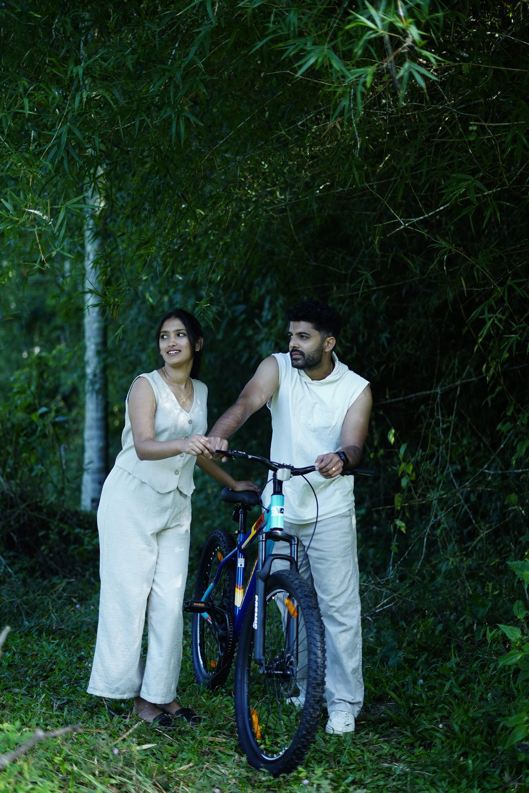 Guests with a mountain bike on the homestay grounds